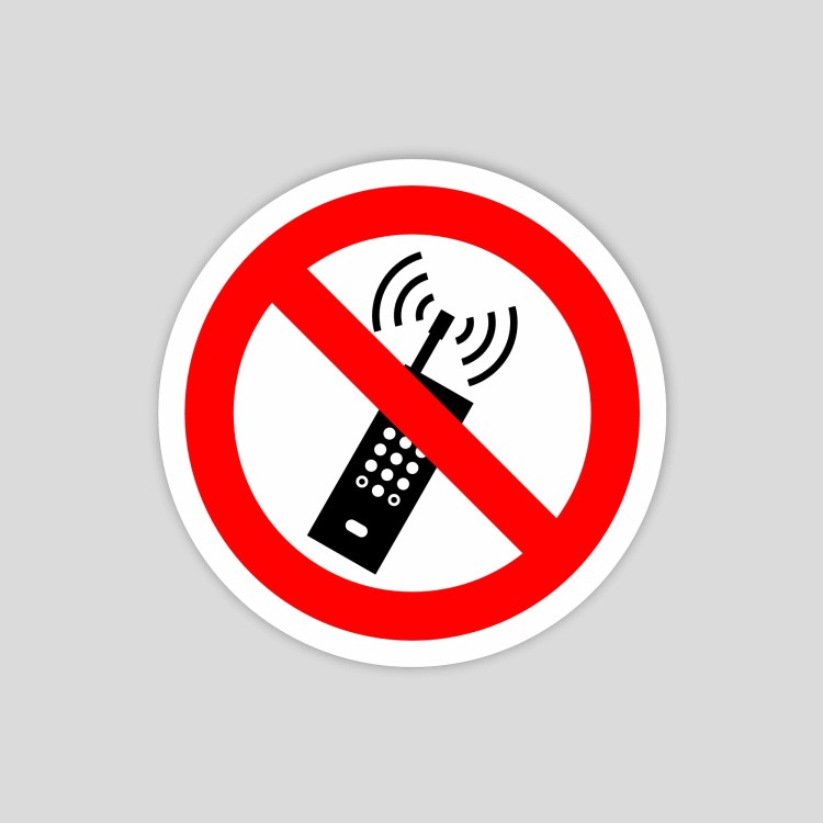 Adhesiu de prohibit l'ús de telèfons mòbils (pictograma)