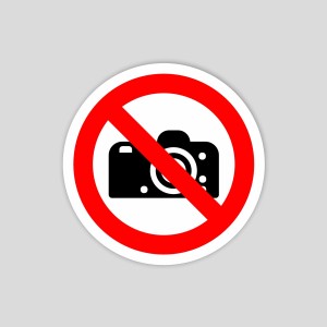Adhesiu de prohibit fer fotos (pictograma)