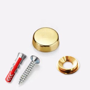 Tornillo y embellecedore dorado